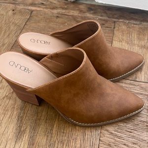 Brown clogs